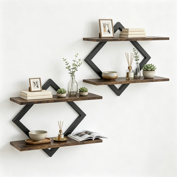 Three dark brown floating wooden shelves with black geometric diamond frames, styled with books, vases, plants, and a bowl against a white wall.