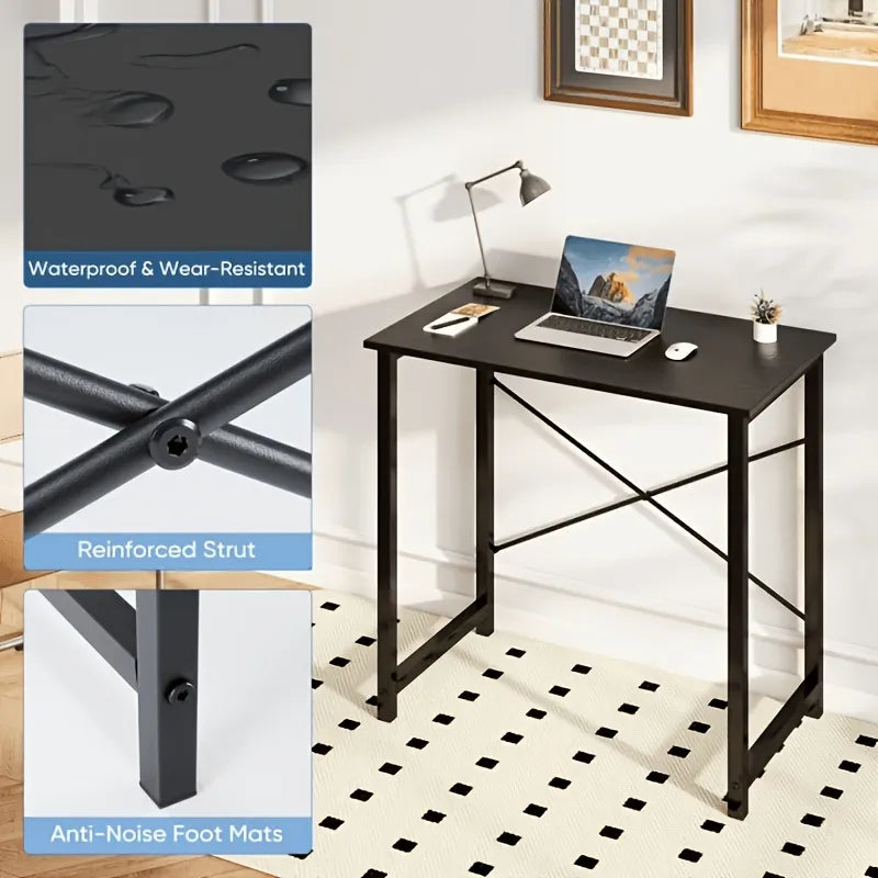 Black desk with laptop and accessories in a room setting, highlighting features like waterproof material and reinforced strut.