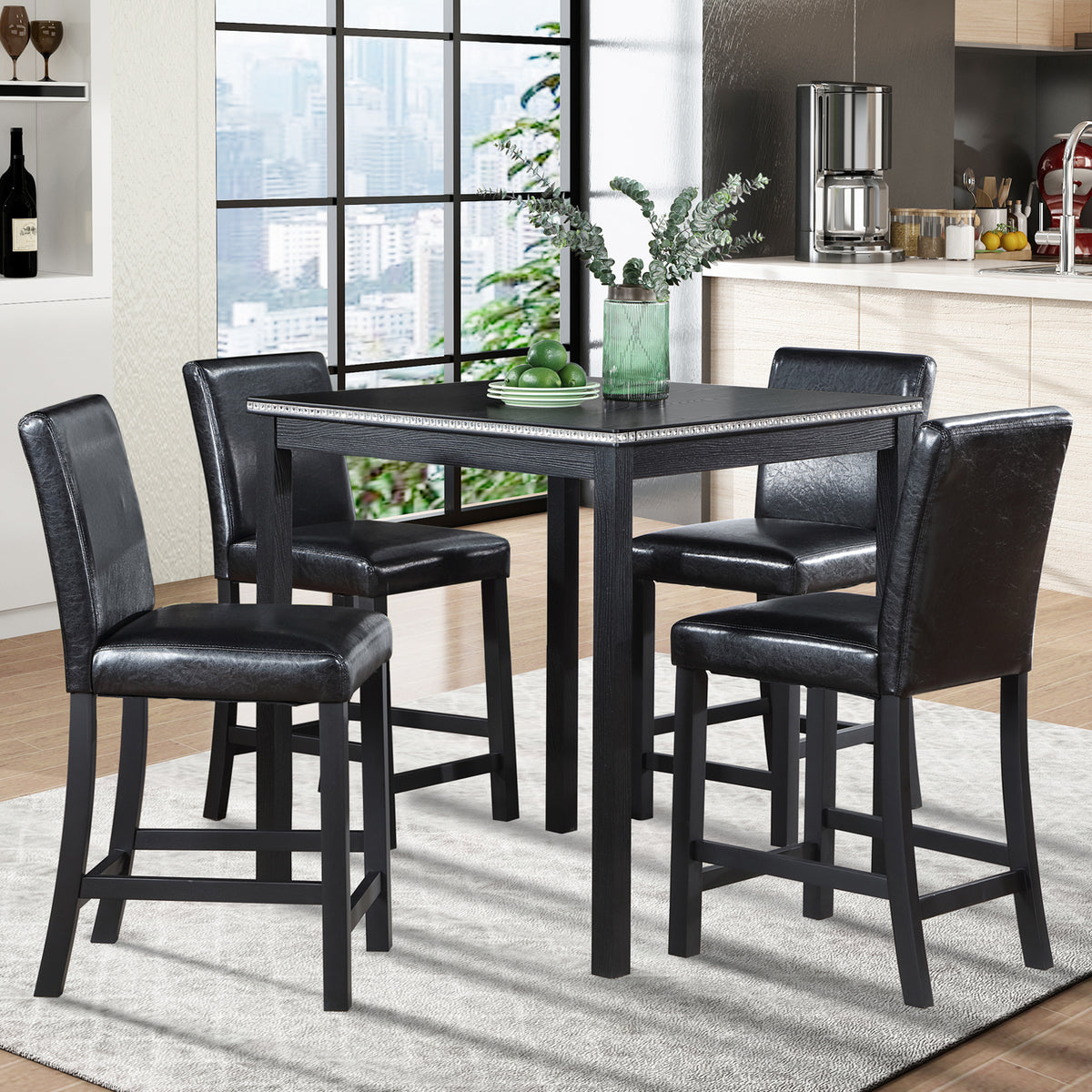 Black dining table set with chairs in a modern kitchen.