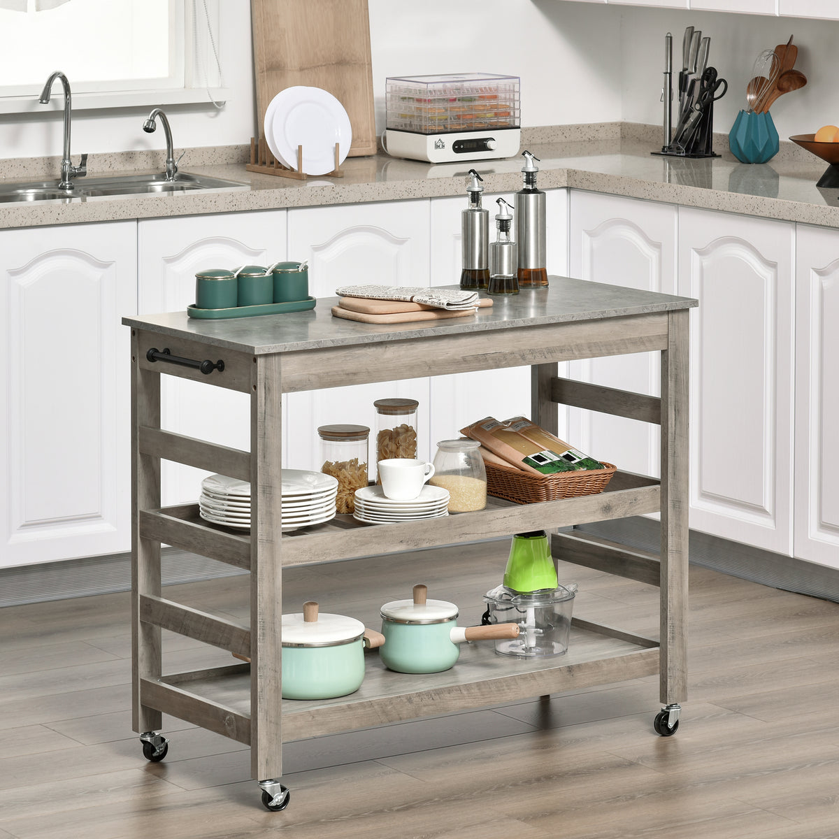 Kitchen island with utensils and cookware in a modern kitchen setting